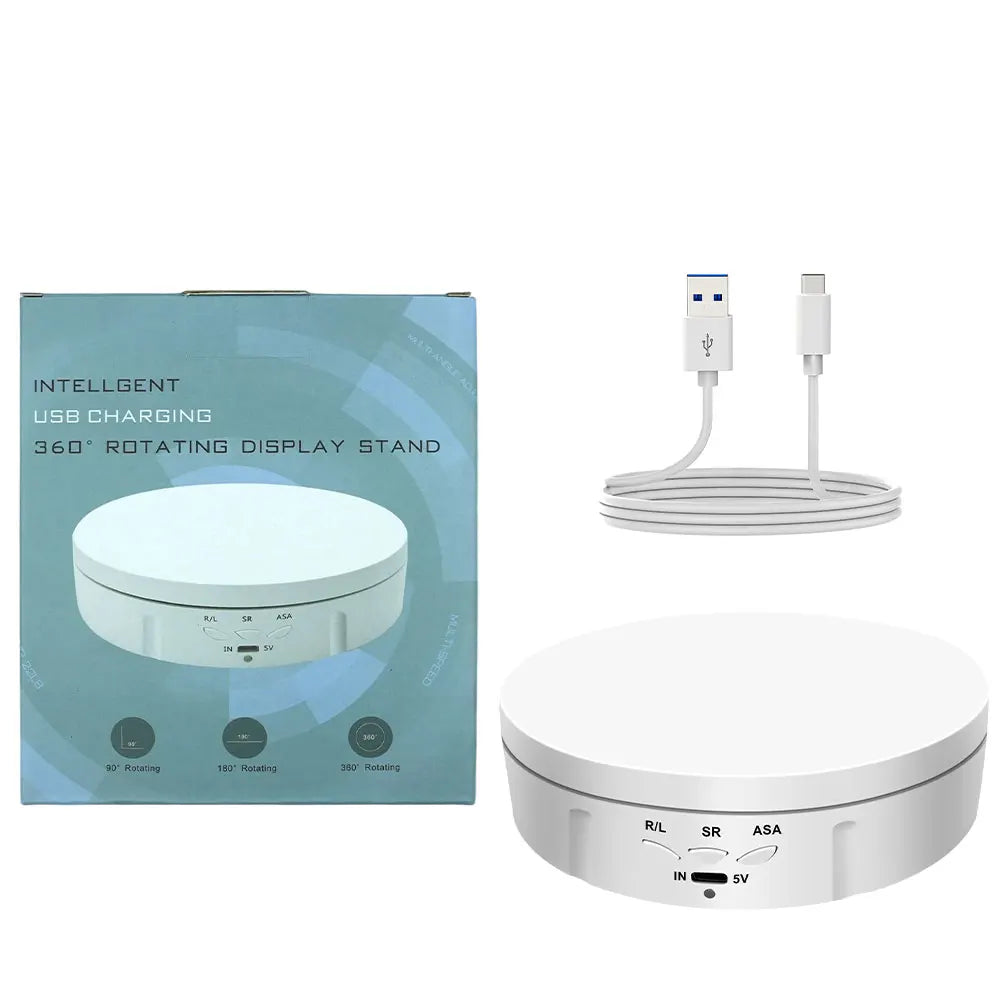 A white intelligent USB charging 360° rotating display stand with a power adapter and cable.