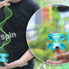 A hand demonstrates a crystal plastic yo-yo trick to a person, showing the professional finger spin technique.