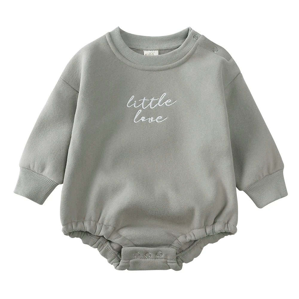 A light gray embroidered cotton baby romper for boys and girls.