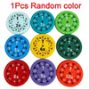 A collection of ten random color math fidget spinners showing various numbers and symbols.