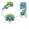 A 3D paper animal puzzle set featuring a peacock and a dinosaur, packaged in a box.