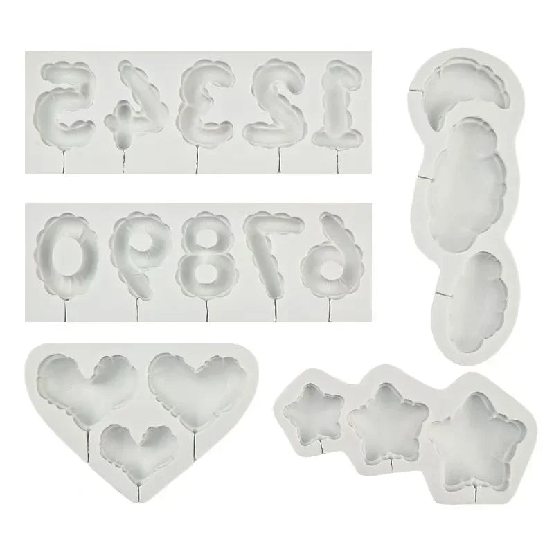 A set of silicone molds shaped like letters, numbers, and hearts for baking and crafts.