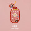 A pink pendant keychain featuring a LABUBU doll and text that reads Loose Waves
