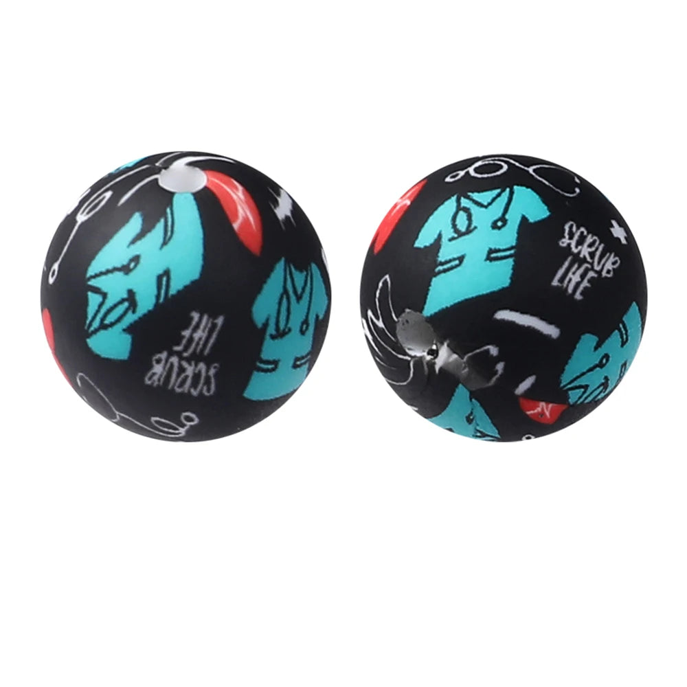 Two black silicone beads with turquoise and red printed designs for jewelry making