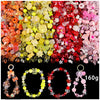 A colorful mix of acrylic beads in various shades including red, yellow, and pink used for DIY jewelry making.