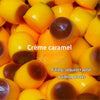 A close-up of yellow caramel pudding squeeze balls filled with sequins and petal building blocks.