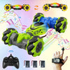A green remote control stunt car is shown with various accessories including a gesture control and a wrist watch.