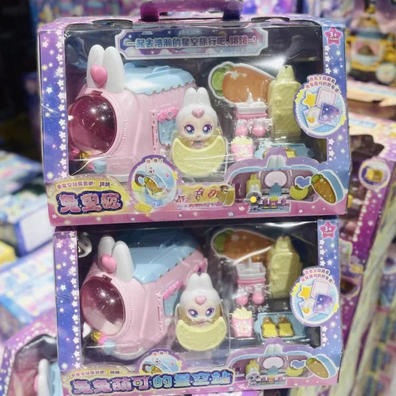 A packaged collectible figure of a pink and purple train with an aurora theme featuring a small doll.