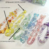 A collection of mixed acrylic loose beads in various colors and shapes for jewelry making.