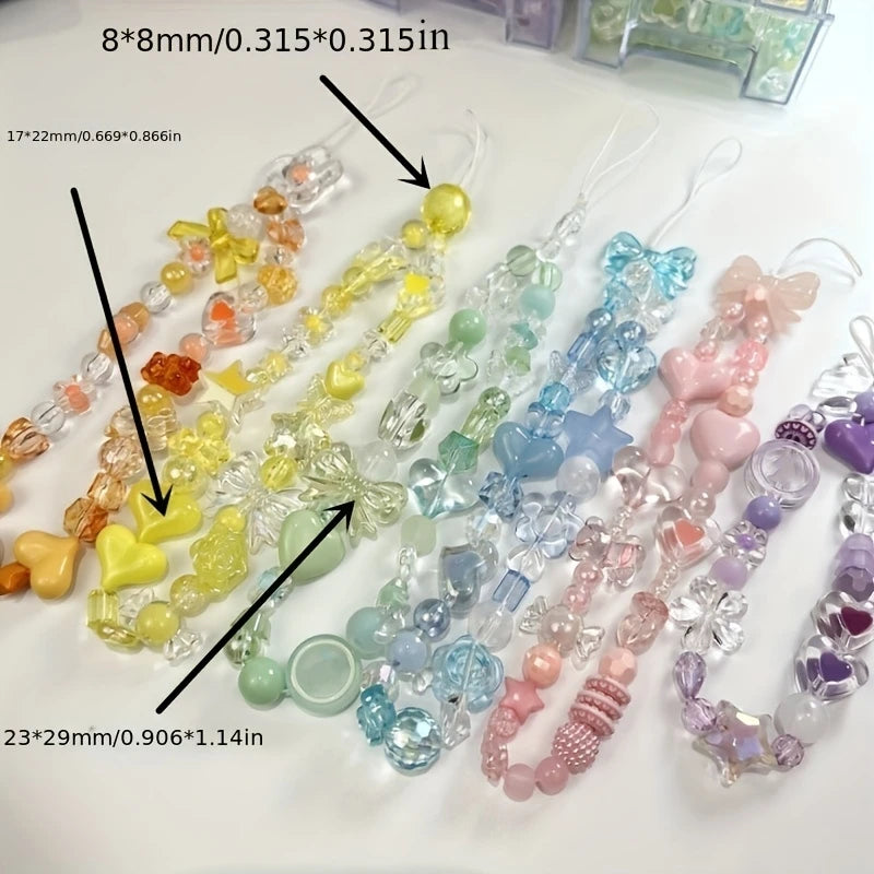 A collection of mixed acrylic loose beads in various colors and shapes for jewelry making.