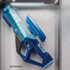 A blue futuristic laser gun toy is displayed in a packaging box.