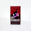 A rectangular box for the Art Robbery card game featuring a dark background and a silhouette of a person holding a painting.