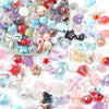 A collection of colorful acrylic bow beads in various shapes and colors for DIY jewelry and crafting.