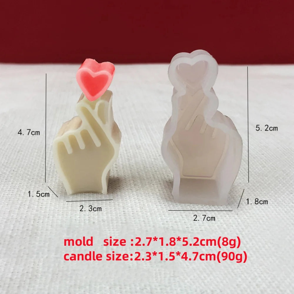 A white silicone mold for making heart-shaped candles, showing the finished product and dimensions.