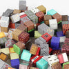 A collection of colorful magnetic building blocks in various shapes and colors for STEM construction.