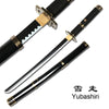 A black katana with a gold hilt and a white-edged blade, shown diagonally.