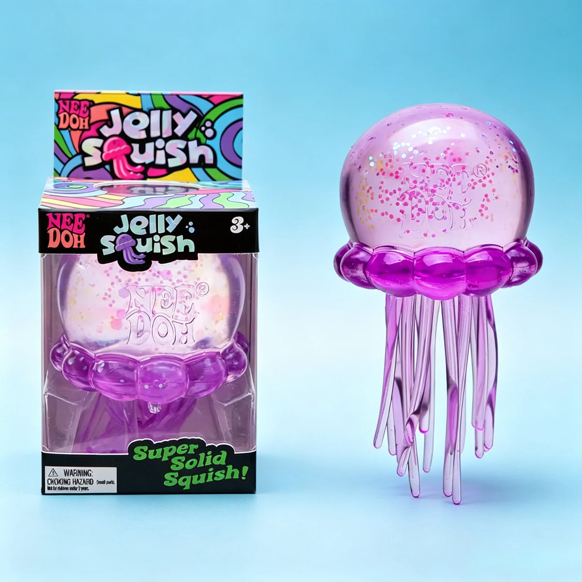 A pink Jellyfish Squish toy with tentacles is shown next to its packaging.