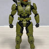 A 1/12 scale Master Chief action figure in olive green armor standing upright.