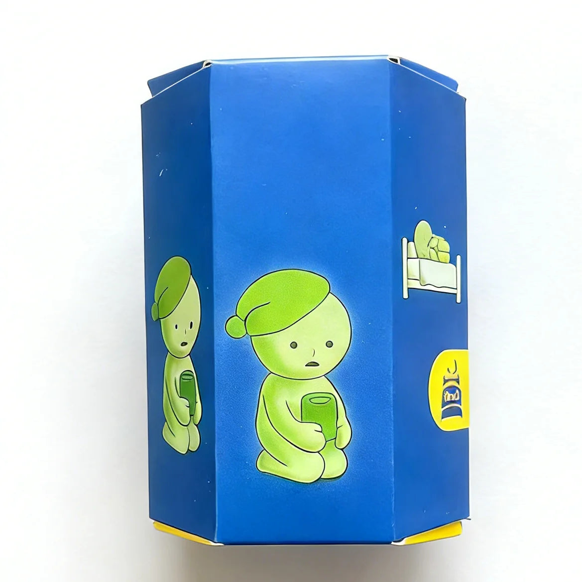 A blue blind box collectible featuring a green elf character and night light components.
