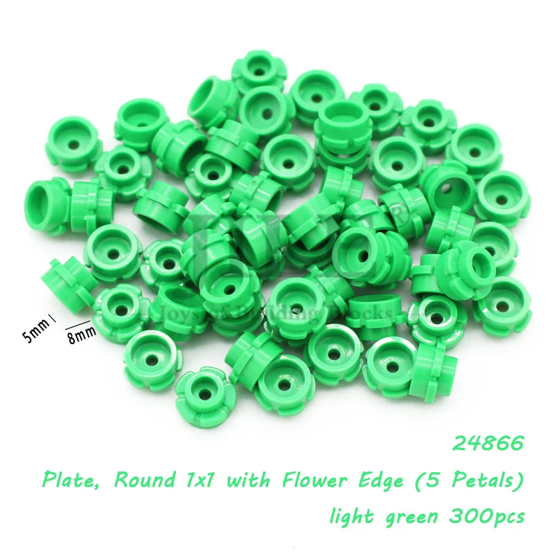 A pile of light green round 1x1 plates with flower edges for building blocks.