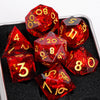 A set of eight red resin dice, including d8s and d10s, displayed on a black tray.