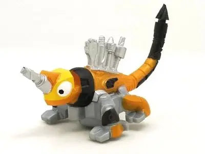 A die-cast dinosaur truck toy with a removable dino figure, featuring orange and gray colors.