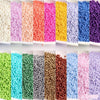 A colorful assortment of 1.5mm solid glass seed beads in various shades including pink, purple, yellow, blue, and green.