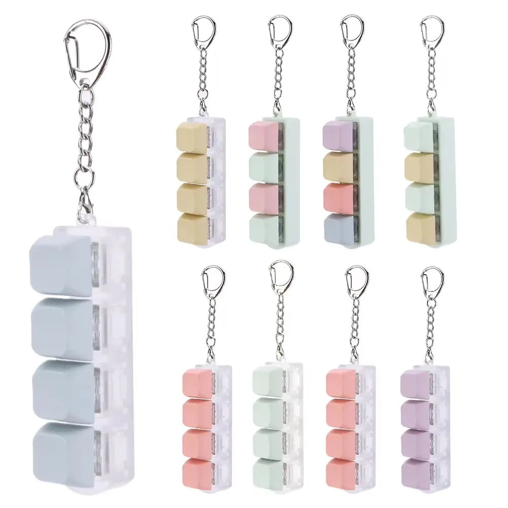 A set of colorful acrylic keycap fidget keychains featuring four clicky key buttons.