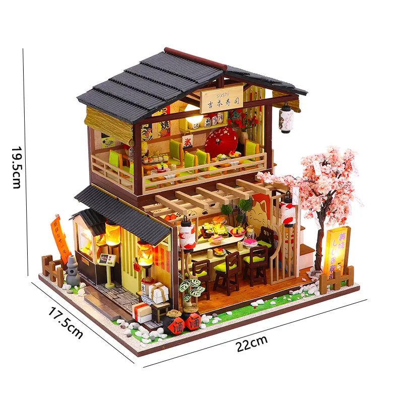 A wooden miniature dollhouse kit featuring traditional Japanese architecture, furniture, and warm lighting elements.