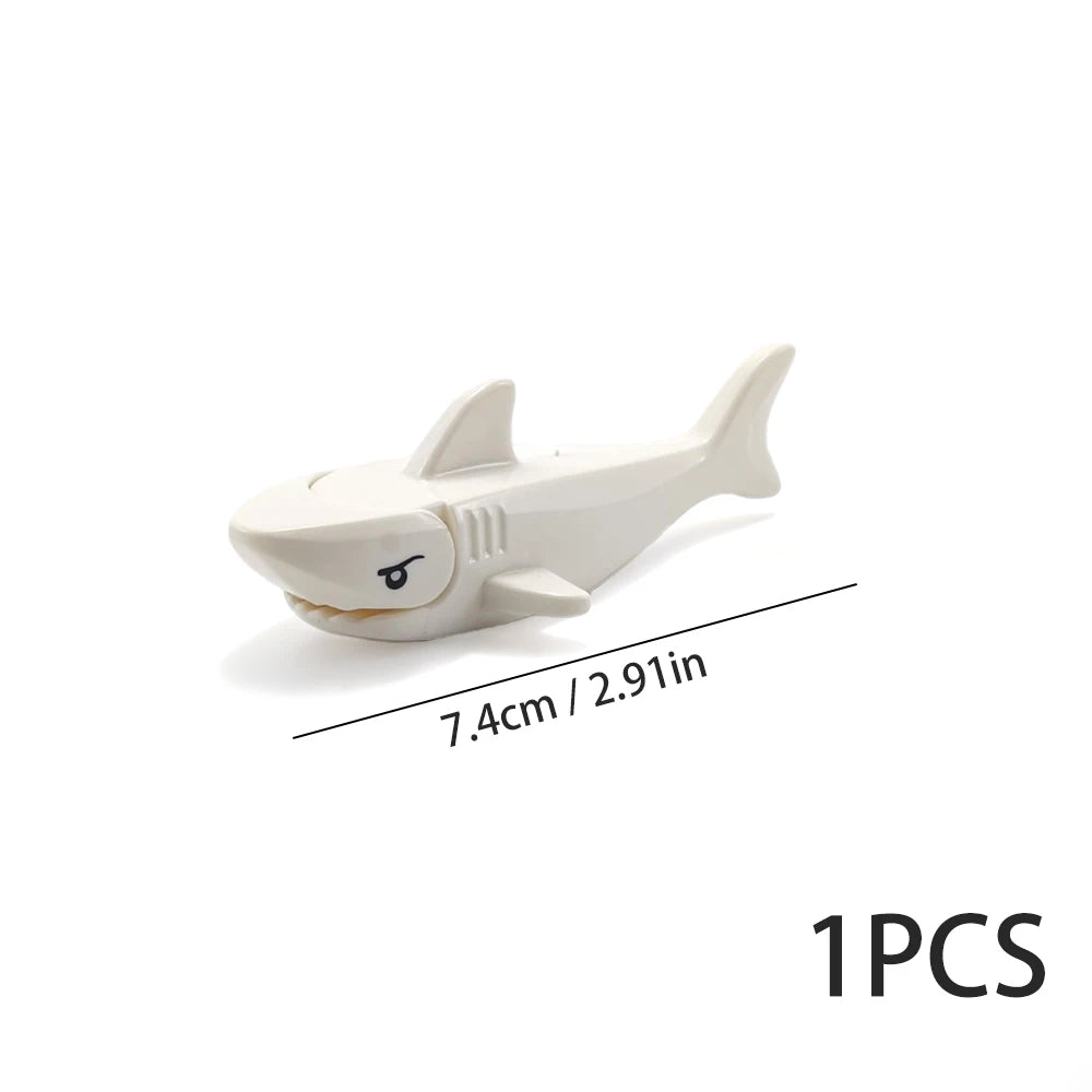 A white plastic model of a marine creature used as an ocean animal building block.
