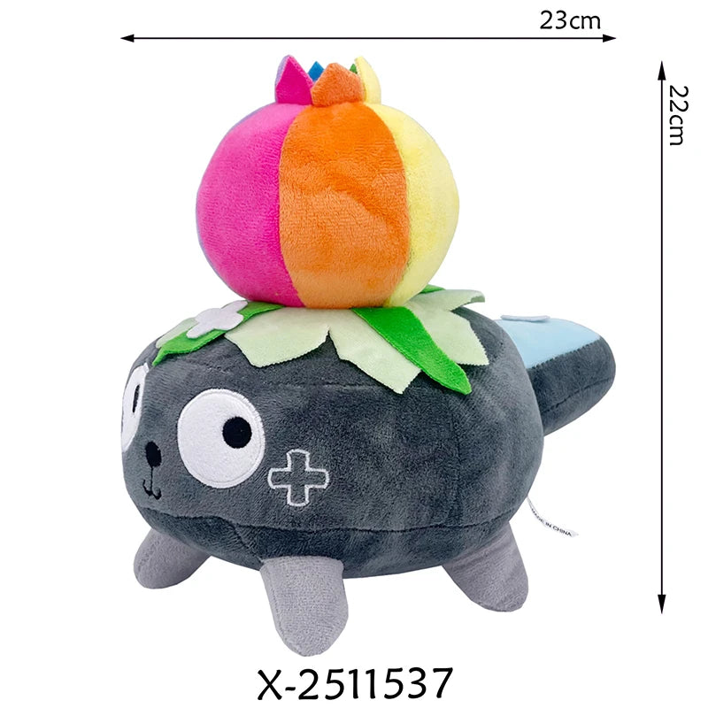 A plush toy resembling a dark gray animal with large eyes and a colorful, striped head.
