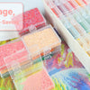 Diamond painting storage trays with lids and an organizer rack showing various colored beads.