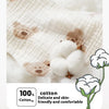 Close-up of soft white cotton gauze fabric with a fluffy cotton ball and text highlighting 100% cotton for gentle use.