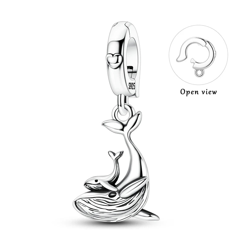 Sterling silver charm pendant set featuring starfish, sea turtle, and whale shark silhouettes.