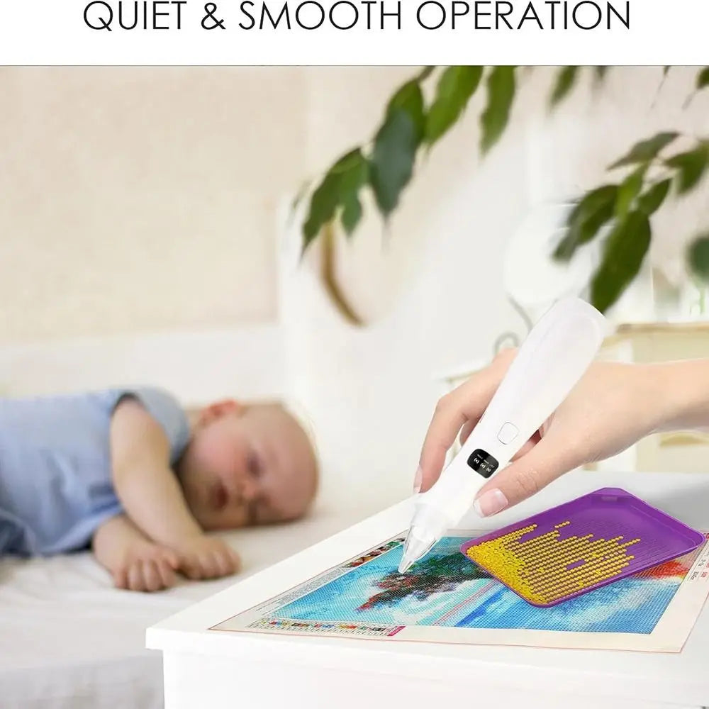 A hand holds a white electric diamond painting pen over a canvas featuring a colorful landscape.