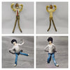 A set of four poseable plush dolls depicting characters from Death Note: L and Light Yagami.