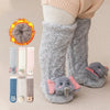 Gray plush baby knee-high socks with elephant ears and a flame graphic.