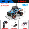 Blue WLtoys 6407-C RC monster truck with FPV camera and remote control accessories
