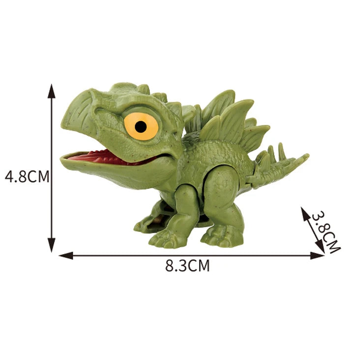 A green finger dinosaur fidget toy with movable joints and a yellow eye, shown from the side.
