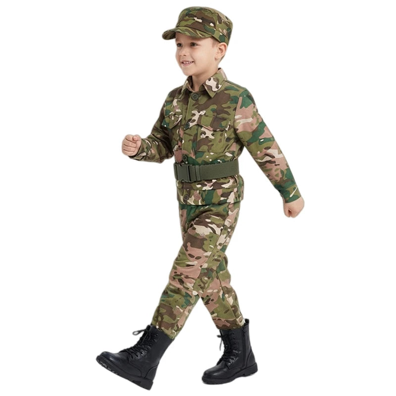 A young boy wearing a camouflage army costume set complete with accessories.