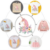 A collection of customizable iron-on faith transfers featuring a unicorn and floral designs on various clothing items and bag
