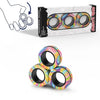 A box of magnetic fidget rings with colorful, marbled designs and three individual rings displayed below.