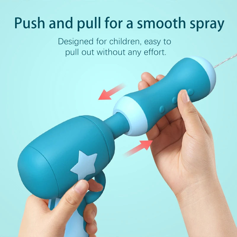A hand is pushing and pulling a blue water gun designed for children to create a smooth spray.