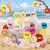 Assorted plush animal keychains in various colors and styles for party favors or classroom rewards