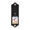 Black leather keychain with a custom photo of a couple engraved on the front