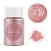 A glass jar of light pink pearl powder next to a circular swatch and loose powder display.