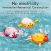 A set of wind-up swimming bath toys featuring ducks and other animals floating in clear water.