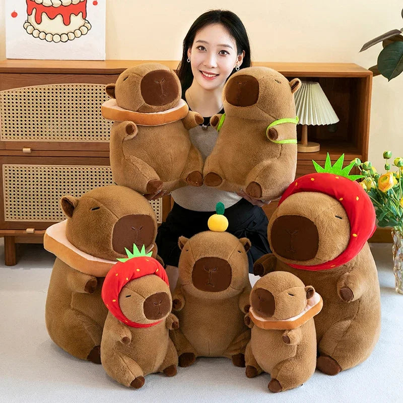 A collection of adorable brown plush toys resembling capybaras in various sizes and colors.