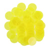 A pile of bright yellow plastic bingo chips for games and family fun