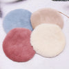 Three round miniature carpet mats in shades of blue, beige, and pink for dollhouse decor